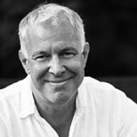 A black and white portrait of a man